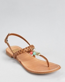 Playful charms accent a thong sandal silhouette from Dolce Vita, adorned with braided details in smooth leather. Playful charms accent a thong sandal silhouette from Dolce Vita, adorned with braided details in smooth leather.