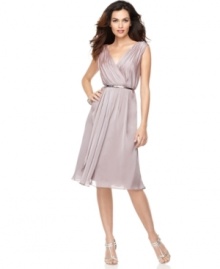 Jones New York's beautiful chiffon dress features an iridescent hue and a graceful, feminine silhouette. The removable metallic belt makes it easy to coordinate with sparkling, strappy shoes. Jones New York's beautiful chiffon dress features an iridescent hue and a graceful, feminine silhouette. The removable metallic belt makes it easy to coordinate with sparkling, strappy shoes.
