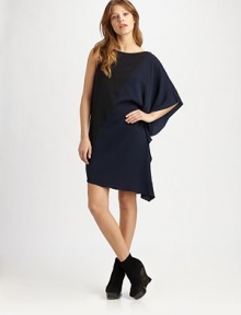 A lightweight swathe of colorblock silk, draped effortlessly from shoulder to hem.BoatneckDropped shoulderSingle open sleeveDraped at one sideAsymmetrical hemAbout 26 from natural waist93% silk/7% spandexDry cleanImportedModel shown is 5'8½ (174cm) wearing US size Small. A lightweight swathe of colorblock silk, draped effortlessly from shoulder to hem.BoatneckDropped shoulderSingle open sleeveDraped at one sideAsymmetrical hemAbout 26 from natural waist93% silk/7% spandexDry cleanImportedModel shown is 5'8½ (174cm) wearing US size Small.