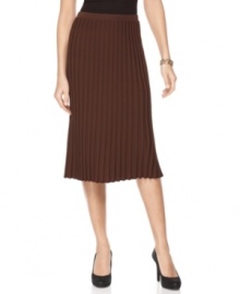 Jones New York's pleated skirt is ideal for a day at the office. Pair it with dark pumps and a solid shirt for a sophisticated look. Jones New York's pleated skirt is ideal for a day at the office. Pair it with dark pumps and a solid shirt for a sophisticated look.