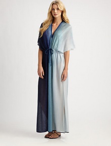 Those legendary knitters turn their attention to a long, light sheer caftan with tonal ombré shading and a subtle shimmer.V necklineShort, wide dolman sleevesDrawstring waistAbout 62 from shoulder to hemRayon/cotton/polyesterDry cleanMade in ItalySIZE & FITModel shown is 5'10 (177cm) wearing US size Small. 