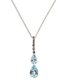 Subtle teardrops add shimmer to your neckline. Judith Jack's stunning y-shaped pendant highlights two pear-cut blue topaz (3-3/8 ct. t.w.) with sparkling marcasite at the bail (1/5 ct. t.w.). Crafted in sterling silver. Approximate length: 16 inches. Approximate drop: 1-5/8 inches. Subtle teardrops add shimmer to your neckline. Judith Jack's stunning y-shaped pendant highlights two pear-cut blue topaz (3-3/8 ct. t.w.) with sparkling marcasite at the bail (1/5 ct. t.w.). Crafted in sterling silver. Approximate length: 16 inches. Approximate drop: 1-5/8 inches.