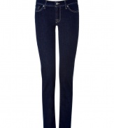 These classic skinny jeans from Seven for All Mankind lend effortless style to any casual ensemble - Five-pocket styling, dark wash denim, distinctive logo detail on back pockets, slim fit, skinny leg - Pair with a tunic top, printed tee, or silk blouse and heels