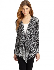 THE LOOKLuxe 2-ply cashmere from expertly maintained inner Mongolian cashmere goatsFeatures long, fine, smooth fibers top-dyed for maximum color saturationAnimal printDraped open frontLong ribbed cuff sleevesAsymmetrical hemTHE FITAbout 34 from shoulder to hemTHE MATERIALCashmereCARE & ORIGINDry cleanImportedModel shown is 5'9½ (176cm) wearing US size Small. THE LOOKLuxe 2-ply cashmere from expertly maintained inner Mongolian cashmere goatsFeatures long, fine, smooth fibers top-dyed for maximum color saturationAnimal printDraped open frontLong ribbed cuff sleevesAsymmetrical hemTHE FITAbout 34 from shoulder to hemTHE MATERIALCashmereCARE & ORIGINDry cleanImportedModel shown is 5'9½ (176cm) wearing US size Small.