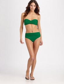 A high-waist design that offers style options. It can be worn under the navel or sit low on hips. Side ruching offers a flattering silhouette.Stretch comfortHigh-waist can also be folded under navel or worn low on hipFull coverageFully lined84% polyamide/16% elastaneHand washImported Please note: Bikini top sold separately. A high-waist design that offers style options. It can be worn under the navel or sit low on hips. Side ruching offers a flattering silhouette.Stretch comfortHigh-waist can also be folded under navel or worn low on hipFull coverageFully lined84% polyamide/16% elastaneHand washImported Please note: Bikini top sold separately.