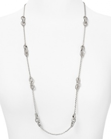 The plot thickens. This Juicy Couture chain link necklace adds instant drama, cast in silver plated metal with a girlie-glam bow toggle closure.