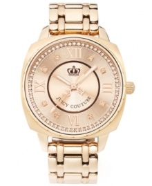 Boisterous glam in a compact design: a stunning timepiece brought to you by Juicy Couture. Beau collection watch by Juicy Couture crafted of rose-gold tone stainless steel bracelet and round case. Rose-gold tone sunray dial crystallized with ring of Swarovski elements features textured inner dial, applied Roman numerals at twelve, three, six and nine o'clock, crystal markers, three hands, text logo and crown logo. Quartz movement. Water resistant to 30 meters. Two-year limited warranty. Boisterous glam in a compact design: a stunning timepiece brought to you by Juicy Couture. Beau collection watch by Juicy Couture crafted of rose-gold tone stainless steel bracelet and round case. Rose-gold tone sunray dial crystallized with ring of Swarovski elements features textured inner dial, applied Roman numerals at twelve, three, six and nine o'clock, crystal markers, three hands, text logo and crown logo. Quartz movement. Water resistant to 30 meters. Two-year limited warranty.