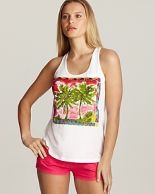A racerback tank top with palm tree print and beading detail on front. A racerback tank top with palm tree print and beading detail on front.