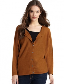 THE LOOKRibbed bateau necklineDolman sleevesButton-down back placketRibbed hem and cuffsTHE FITAbout 26 from shoulder to hemTHE MATERIALCashmereCARE & ORIGINDry cleanImported