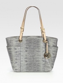 A polished design in embossed snakeskin leather accented with shiny link chains.Double chain and embossed snakeskin leather shoulder straps, 9¾ dropTop zip closureTwo outside open pocketsOne inside zip pocketFour inside open pocketsFully lined14W X 11H X 5½DImported A polished design in embossed snakeskin leather accented with shiny link chains.Double chain and embossed snakeskin leather shoulder straps, 9¾ dropTop zip closureTwo outside open pocketsOne inside zip pocketFour inside open pocketsFully lined14W X 11H X 5½DImported