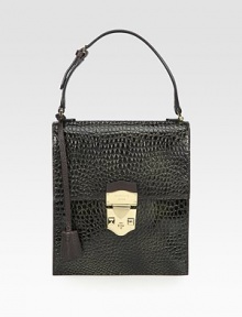 Beautiful glossy textured leather in a chic narrow frame.Adjustable top handle, 4½-6½ dropPush-lock flap closureOne inside open pocketLeather lining7¾W X 9H X 2DMade in Italy Beautiful glossy textured leather in a chic narrow frame.Adjustable top handle, 4½-6½ dropPush-lock flap closureOne inside open pocketLeather lining7¾W X 9H X 2DMade in Italy