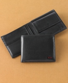 Slim down your essentials with the sleek, thin design of this smooth leather coin wallet from Tumi. Slim down your essentials with the sleek, thin design of this smooth leather coin wallet from Tumi.