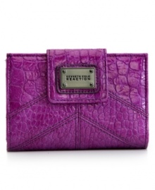 Fulfill your fetish for high-shine accessorizing with this glossy, glammed-up wallet from Kenneth Cole Reaction. The exterior is pure posh with croc-embossed print and shiny signature hardware, while the interior is all about organization with plenty of pockets and compartments for cash, cards, coins and ID. Fulfill your fetish for high-shine accessorizing with this glossy, glammed-up wallet from Kenneth Cole Reaction. The exterior is pure posh with croc-embossed print and shiny signature hardware, while the interior is all about organization with plenty of pockets and compartments for cash, cards, coins and ID.