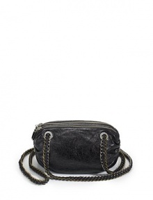 THE LOOKOval shape of distressed leatherDual two tone chain-link and leather crossbody strapsDual top zip closureOne inside zip pocketOne inside open pocketTHE FITDual crossbody straps, 18 drop10W X 6H X 2½DTHE MATERIALLeatherFully linedORIGINImported THE LOOKOval shape of distressed leatherDual two tone chain-link and leather crossbody strapsDual top zip closureOne inside zip pocketOne inside open pocketTHE FITDual crossbody straps, 18 drop10W X 6H X 2½DTHE MATERIALLeatherFully linedORIGINImported