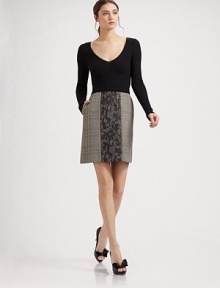 Classic design pairs a rib-knit bodice and plaid skirt with a touch of lace front and center.Deep V neckline Long sleeves Side pockets About 17¾ from natural waist Virgin wool Dry clean Made in Italy