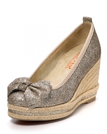 These playful KORS Michael Kors wedges boast a wrapped jute heel and bow crowned glitter upper for new-season charm. These playful KORS Michael Kors wedges boast a wrapped jute heel and bow crowned glitter upper for new-season charm.