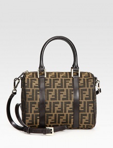 Classic logo canvas jacquard covers this barrel shape, finished with rich leather trim and optional shoulder strap for a versatile style. Double leather top handles, 6 dropAdjustable, detachable leather shoulder strap, 22½-25½ dropOne inside open pocketCotton lining10W X 7½H X 4½DMade in Italy Classic logo canvas jacquard covers this barrel shape, finished with rich leather trim and optional shoulder strap for a versatile style. Double leather top handles, 6 dropAdjustable, detachable leather shoulder strap, 22½-25½ dropOne inside open pocketCotton lining10W X 7½H X 4½DMade in Italy