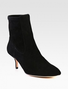 This on-trend suede ankle boot has a back stretch panel for superior comfort. Self-covered heel, 2¾ (70mm)Suede upper and stretch suede back panelPull-on styleLeather lining and solePadded insoleImportedOUR FIT MODEL RECOMMENDS ordering one half size down as this style runs large. This on-trend suede ankle boot has a back stretch panel for superior comfort. Self-covered heel, 2¾ (70mm)Suede upper and stretch suede back panelPull-on styleLeather lining and solePadded insoleImportedOUR FIT MODEL RECOMMENDS ordering one half size down as this style runs large.
