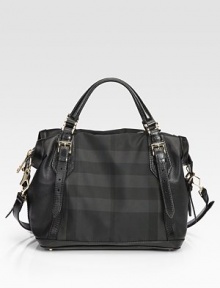 An incredibly roomy bag crafted from a chic pairing of check nylon and perforated leather.Adjustable double top handles, 3-6 dropAdjustable removable shoulder strap, 24½-26 dropTop zip closureProtective metal feetOne inside zip pocketTwo inside open pocketsNylon lining16½W X 11H X 7½DImported An incredibly roomy bag crafted from a chic pairing of check nylon and perforated leather.Adjustable double top handles, 3-6 dropAdjustable removable shoulder strap, 24½-26 dropTop zip closureProtective metal feetOne inside zip pocketTwo inside open pocketsNylon lining16½W X 11H X 7½DImported