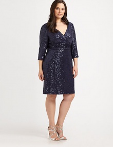 A stylishly sequin, jersey design with waist-flattering gathered details for an enviable look.V-neckThree-quarter sleevesAllover sequinsGathered waistBack zipperFully linedAbout 24 from natural waist94% polyester/6% spandexDry cleanImported