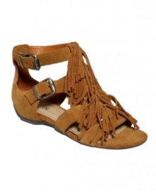 Flats are better with fringe. Kenneth Cole Reaction's Audra Struck wedge sandals feature two adjustable side buckles and enough fringe to keep you moving and grooving throughout the day.