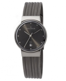 Fine Danish style by Skagen Denmark. This tailored watch features a charcoal mesh stainless steel bracelet and round case. Charcoal dial with logo, date window and silvertone stick indices. Quartz movement. Water resistant to 30 meters. Limited lifetime warranty.