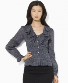 A flourish of ruffles and a peplum hem add feminine allure to Lauren Jeans Co.'s soft woven cotton blouse, finished in a heritage checked pattern