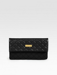 Sumptuous quilted leather design crafted in a sleek foldover silhouette.Magnetic flap closure Open pocket and zip pocket under flap Inside compartment from top of flap Fully lined 11½W X 7H X 1D Made in Italy Sumptuous quilted leather design crafted in a sleek foldover silhouette.Magnetic flap closure Open pocket and zip pocket under flap Inside compartment from top of flap Fully lined 11½W X 7H X 1D Made in Italy