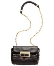 Add a little shimmy and a lot of drama to your look with this can't-be-missed crossbody bag featuring light-catching sequins, goldtone hardware and a thick braided shoulder strap. Add a little shimmy and a lot of drama to your look with this can't-be-missed crossbody bag featuring light-catching sequins, goldtone hardware and a thick braided shoulder strap.