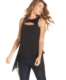 BCBGMAXAZRIA contrasts soft layers of chiffon with a sexy cutout and sparkling sequins. Try this top with jeans and heels for a night out, or wear it with a fitted skirt for a special event!