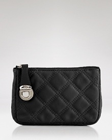 In a pretty pastel shade, Marc Jacobs' quilted leather pouch hints at girlie-chic. In a pretty pastel shade, Marc Jacobs' quilted leather pouch hints at girlie-chic.