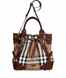 Whether paired with casual looks or an early evening cocktail ensemble, make a bold statement in this luxe, logo-laden tote from Burberry London - Classic carryall style, leather carrying handles and convertible shoulder strap, leather trim detailing and multiple straps, logo printed body, metal feet at bottom, multiple internal pockets- Perfect for daily use or off-duty chic Whether paired with casual looks or an early evening cocktail ensemble, make a bold statement in this luxe, logo-laden tote from Burberry London - Classic carryall style, leather carrying handles and convertible shoulder strap, leather trim detailing and multiple straps, logo printed body, metal feet at bottom, multiple internal pockets- Perfect for daily use or off-duty chic