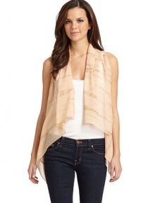 THE LOOKOpen frontSleevelessAsymmetrical hemlineLeather back panelTHE FITAbout 32 from shoulder to hemTHE MATERIALFront: silkBack: leatherCARE & ORIGINDry cleanImportedModel shown is 5'9 (175cm) wearing US size Small. THE LOOKOpen frontSleevelessAsymmetrical hemlineLeather back panelTHE FITAbout 32 from shoulder to hemTHE MATERIALFront: silkBack: leatherCARE & ORIGINDry cleanImportedModel shown is 5'9 (175cm) wearing US size Small.