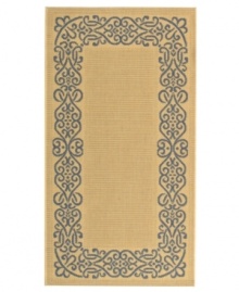 Borrowing from the beautiful tradition of courtyard styling in warm-weather locales, Safavieh's Courtyard collection has a distinctly Mediterranean feel. A special sisal weave allows for a superior clarity of detail, while enhanced polypropylene makes these rugs thankfully low-maintenance and durable. This textured beige rug features a needlepoint-inspired, cornflower blue border, offering plenty of classic charm for indoor or outdoor spaces. (Clearance)