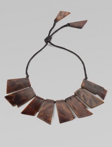 This bold, statement-making design is made up of glossy, geometric tortoise panels.HornCotton cordLength, about 8Pendant length, about 2½Imported This bold, statement-making design is made up of glossy, geometric tortoise panels.HornCotton cordLength, about 8Pendant length, about 2½Imported