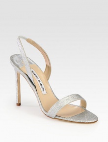 Strappy closet staple with a slender heel, impeccably-crafted of glitter-coated fabric. Self-covered heel, 4 (100mm)Glitter-coated fabric upperLeather lining and solePadded insoleMade in ItalyOUR FIT MODEL RECOMMENDS ordering true size. 