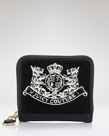 Soft velour cushions your cash in Juicy Couture style. Soft velour cushions your cash in Juicy Couture style.