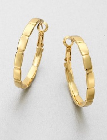 Add interest with this shiny design with 14k goldplating. 14k goldplated brassLength, about 1.25Hinged post backImported Add interest with this shiny design with 14k goldplating. 14k goldplated brassLength, about 1.25Hinged post backImported