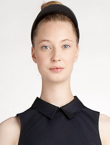 A sculptural visor-inspired piece, rendered in supple Italian leather.LeatherDry cleanMade in Italy A sculptural visor-inspired piece, rendered in supple Italian leather.LeatherDry cleanMade in Italy