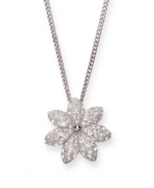 Fanciful in floral. This pendant features a sparkling flower motif decorated with clear crystals in Swarovski's signature Pointiage® technique. Setting and chain crafted in silver tone mixed metal. Approximate length: 15 inches. Approximate drop: 1/2 inch. Fanciful in floral. This pendant features a sparkling flower motif decorated with clear crystals in Swarovski's signature Pointiage® technique. Setting and chain crafted in silver tone mixed metal. Approximate length: 15 inches. Approximate drop: 1/2 inch.
