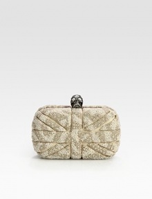 An iconic skull clasp accents this frame-top shape, finely-textured with luxe nappa cachemire and pearl beading. Clasp top closureLeather lining6¾W X 3H X ¾DMade in Italy