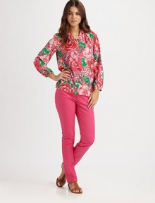 A vibrant floral print combines effortlessly with golden buttons and a relaxed silhouette.Split collarGathered three-quarter sleevesLow-riseButton placketFront pocketPolyesterMachine washImported Model shown is 5'10 (177cm) wearing US size Small. A vibrant floral print combines effortlessly with golden buttons and a relaxed silhouette.Split collarGathered three-quarter sleevesLow-riseButton placketFront pocketPolyesterMachine washImported Model shown is 5'10 (177cm) wearing US size Small.