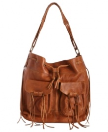 Laid-back with a veritable '70s vibe, this Jordana hobo from Lucky Brand has haute hippie-chic allure. The slouchy silhouette is crafted from the softest leather and features convenient front pockets with decorative tie accents, while the well-organized interior easily stows all your day-to-day essentials. Laid-back with a veritable '70s vibe, this Jordana hobo from Lucky Brand has haute hippie-chic allure. The slouchy silhouette is crafted from the softest leather and features convenient front pockets with decorative tie accents, while the well-organized interior easily stows all your day-to-day essentials.