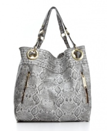 Gleaming gold ring hardware and python embossing lend this Steve Madden purse a glam vibe this season. Gleaming gold ring hardware and python embossing lend this Steve Madden purse a glam vibe this season.
