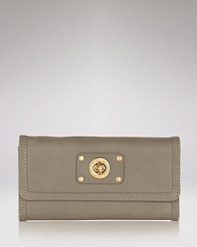Part of the Totally Turnlock collection from MARC BY MARC JACOBS. A single turnlock lends urbane sophistication to this chic calfskin wallet.
