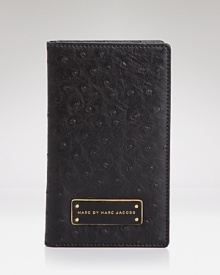 Take MARC BY MARC JACOBS' enviable style with you when you go with this travel wallet, boasting a polished look and plenty of pockets for your first class essentials. Take MARC BY MARC JACOBS' enviable style with you when you go with this travel wallet, boasting a polished look and plenty of pockets for your first class essentials.