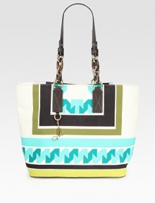 Be ready for summer days with this roomy carryall of luxe canvas, featuring a bright geometric print and sleek leather top handles. Double leather and chain top handles, 11¼ dropMagnetic snap closureProtective metal feetOne inside zip pocketTwo inside open pocketsFully lined13W X 12¾H X 6¼DImported Be ready for summer days with this roomy carryall of luxe canvas, featuring a bright geometric print and sleek leather top handles. Double leather and chain top handles, 11¼ dropMagnetic snap closureProtective metal feetOne inside zip pocketTwo inside open pocketsFully lined13W X 12¾H X 6¼DImported
