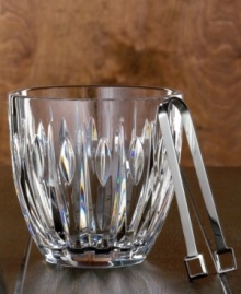 Modern cuts on timeless crystal give this ice bucket a dramatic appeal. Perfect when making drinks on the rocks or for chilling wine or champagne. Includes a pair of stainless steel tongs. Modern cuts on timeless crystal give this ice bucket a dramatic appeal. Perfect when making drinks on the rocks or for chilling wine or champagne. Includes a pair of stainless steel tongs.