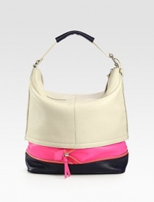Sumptuous leather in a bold colorblocked palette, finished with an extendable bottom zip-panel.Shoulder strap, 8 dropTop zip closureProtective metal feetOne inside zip pocketTwo inside open pocketsCotton lining16½W X 14H X 6DImported Sumptuous leather in a bold colorblocked palette, finished with an extendable bottom zip-panel.Shoulder strap, 8 dropTop zip closureProtective metal feetOne inside zip pocketTwo inside open pocketsCotton lining16½W X 14H X 6DImported