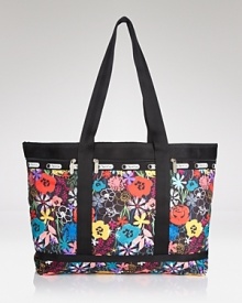 LeSportsac's signature nylon tote flaunts vivid flowers and plenty of room for must-haves. The color-clad bag takes you on weekend errands or jet-setting adventures with stylish sensibility. LeSportsac's signature nylon tote flaunts vivid flowers and plenty of room for must-haves. The color-clad bag takes you on weekend errands or jet-setting adventures with stylish sensibility.